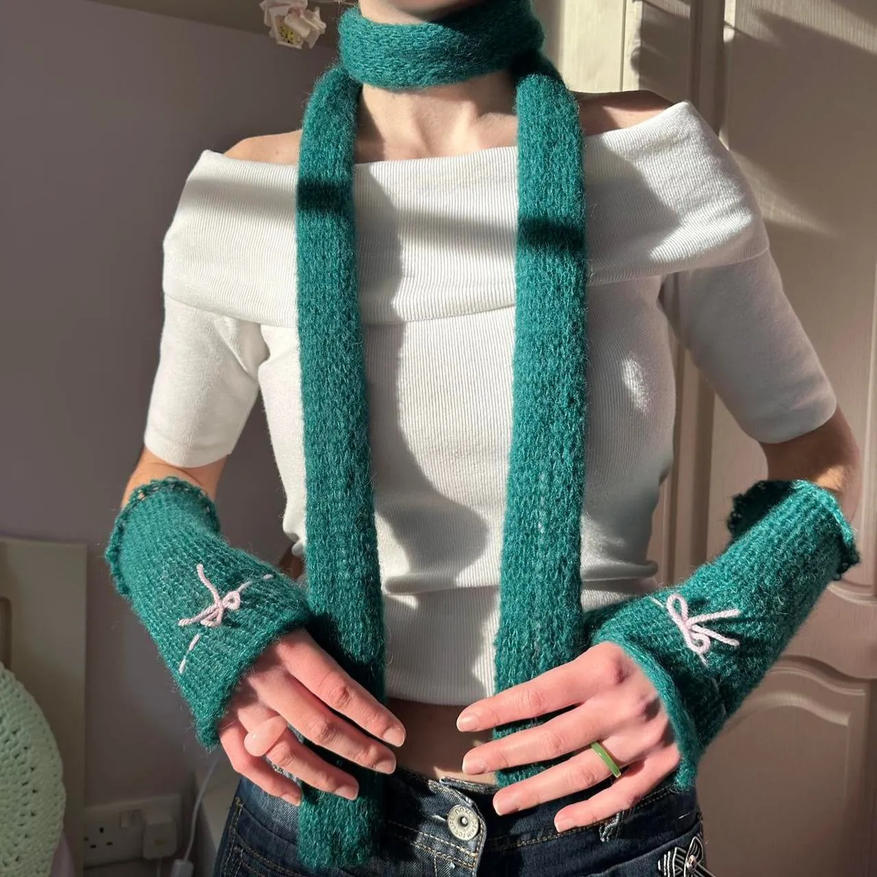 Handmade knitted mohair bow gloves in emerald green and baby pink - with thumb hole