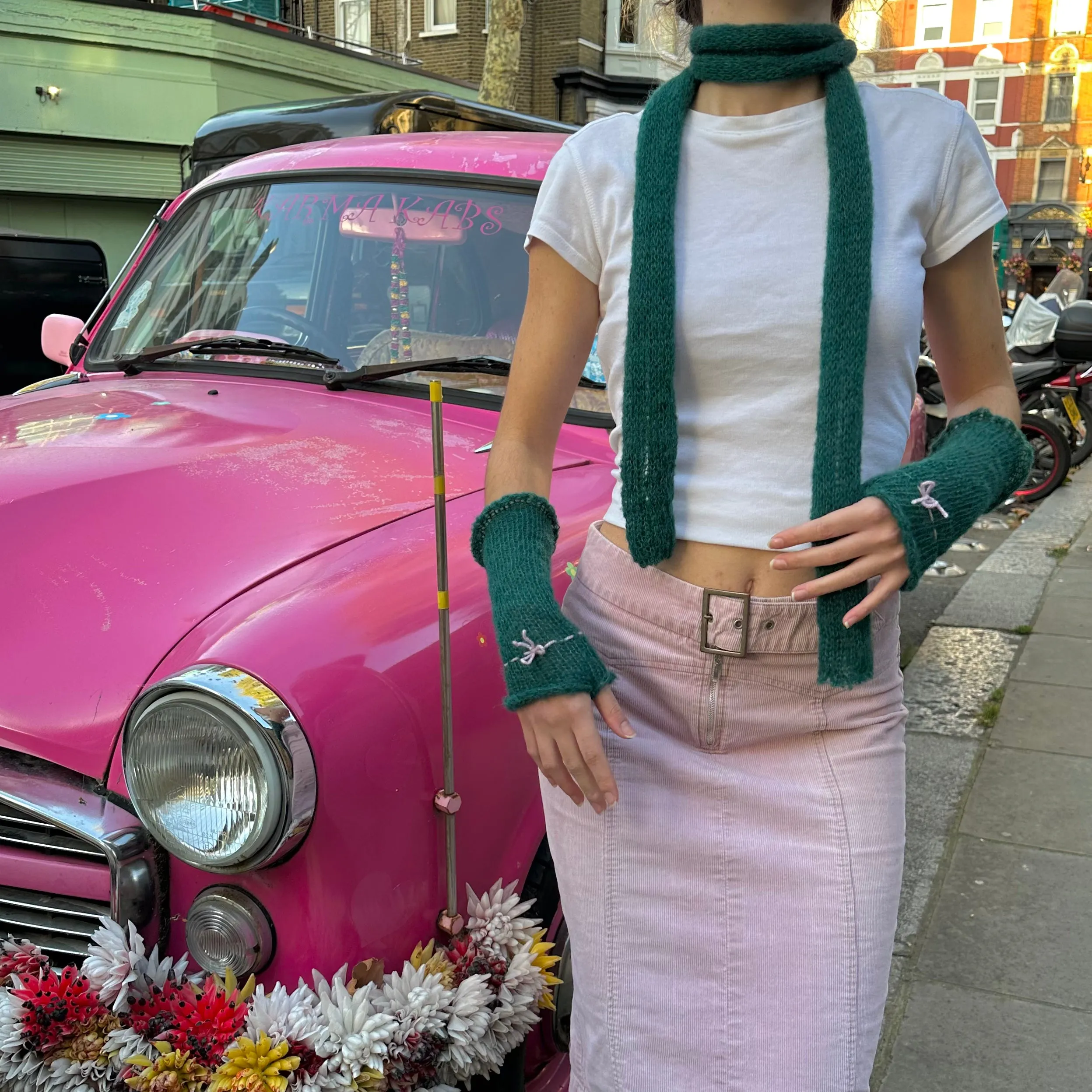 Handmade knitted mohair bow gloves in emerald green and baby pink - with thumb hole