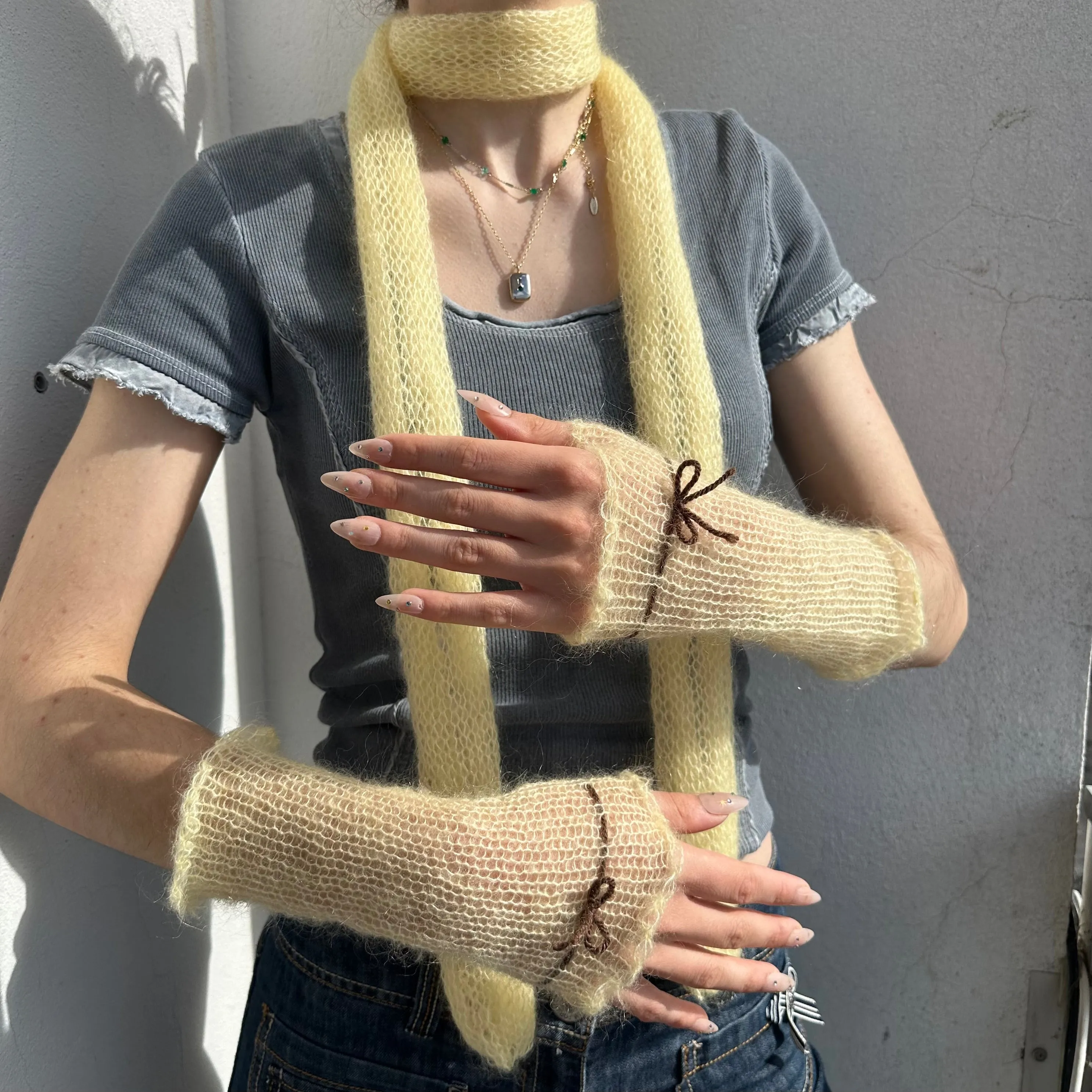 Handmade knitted mohair bow gloves in light yellow and brown - with thumb hole