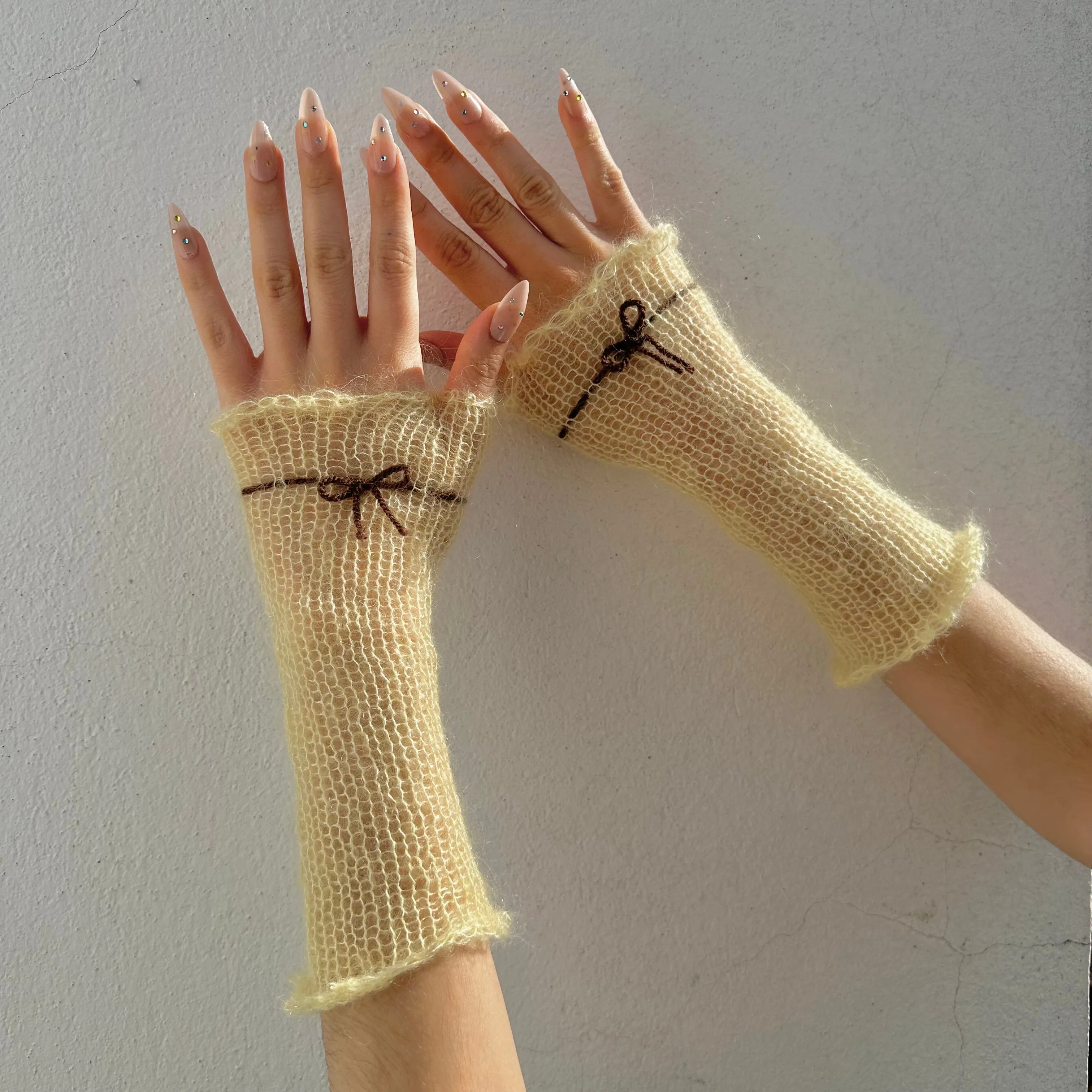 Handmade knitted mohair bow gloves in light yellow and brown - with thumb hole