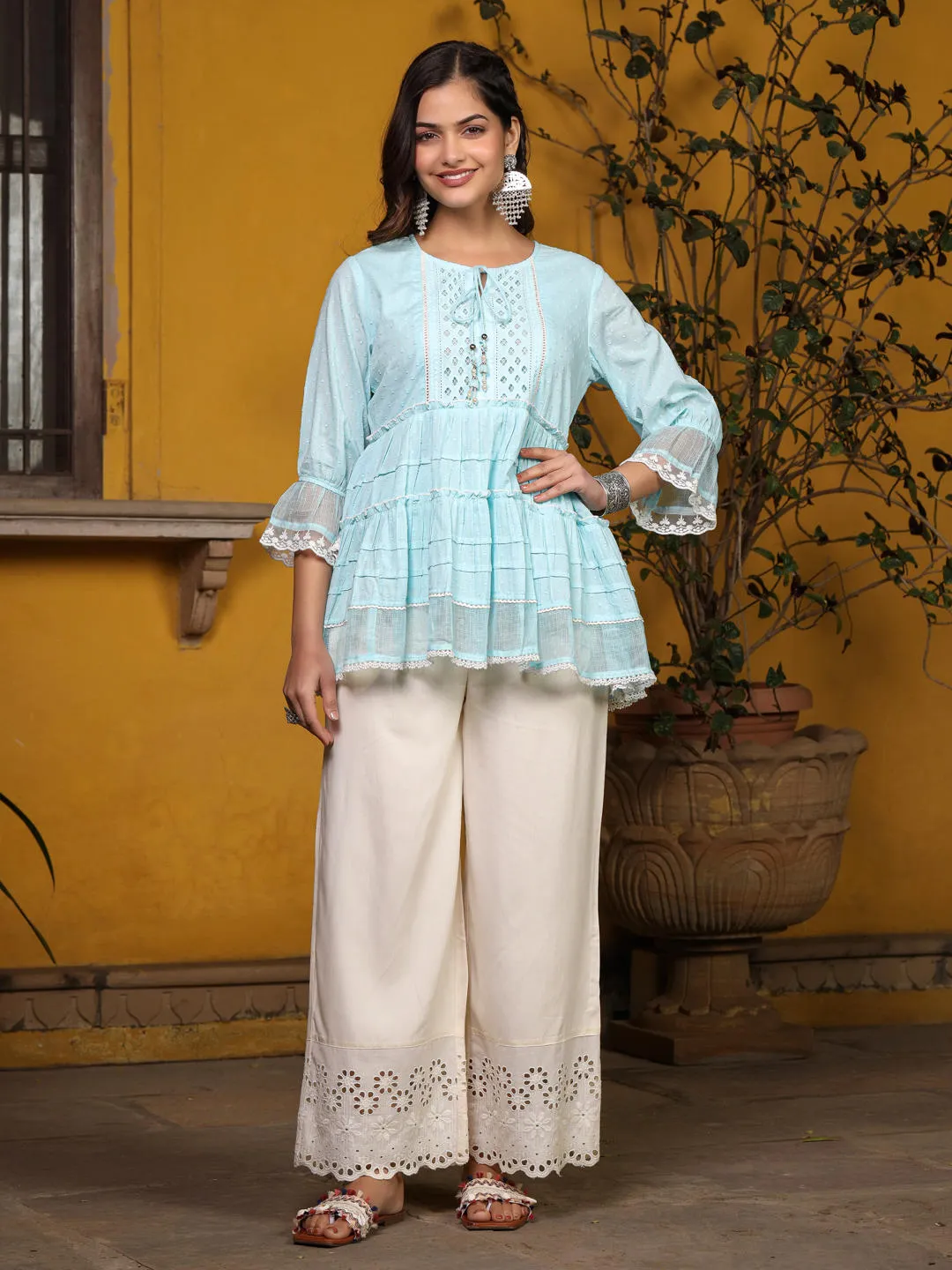 Jashvi Sky Blue Solid Peplum Lacy Keyhole Neckline Tunic With Lining