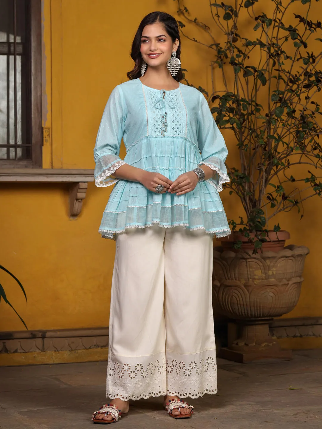 Jashvi Sky Blue Solid Peplum Lacy Keyhole Neckline Tunic With Lining