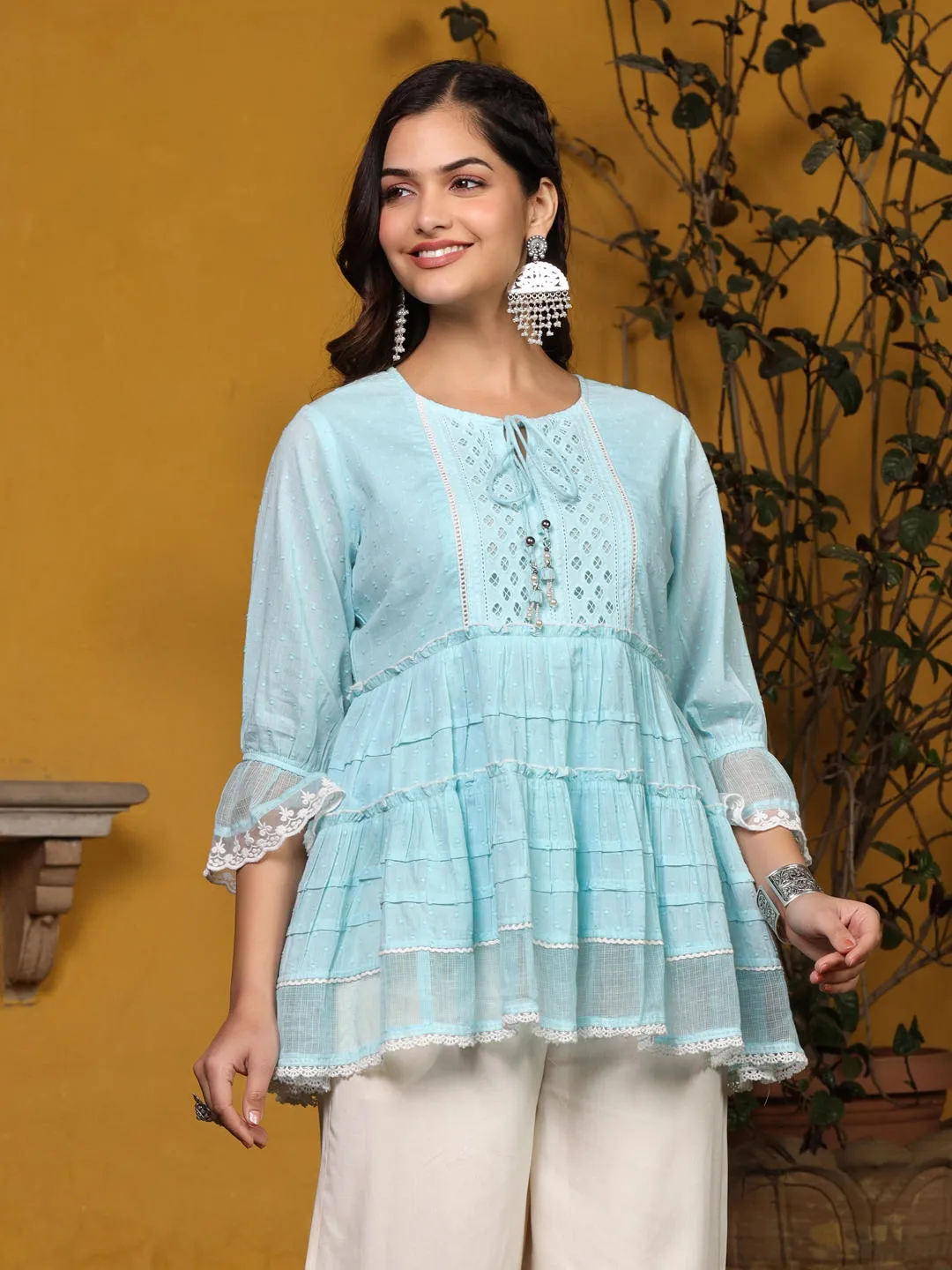 Jashvi Sky Blue Solid Peplum Lacy Keyhole Neckline Tunic With Lining