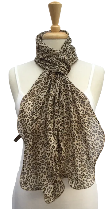 SL07-28 Brown and yellow animal print scarf with curled edges.